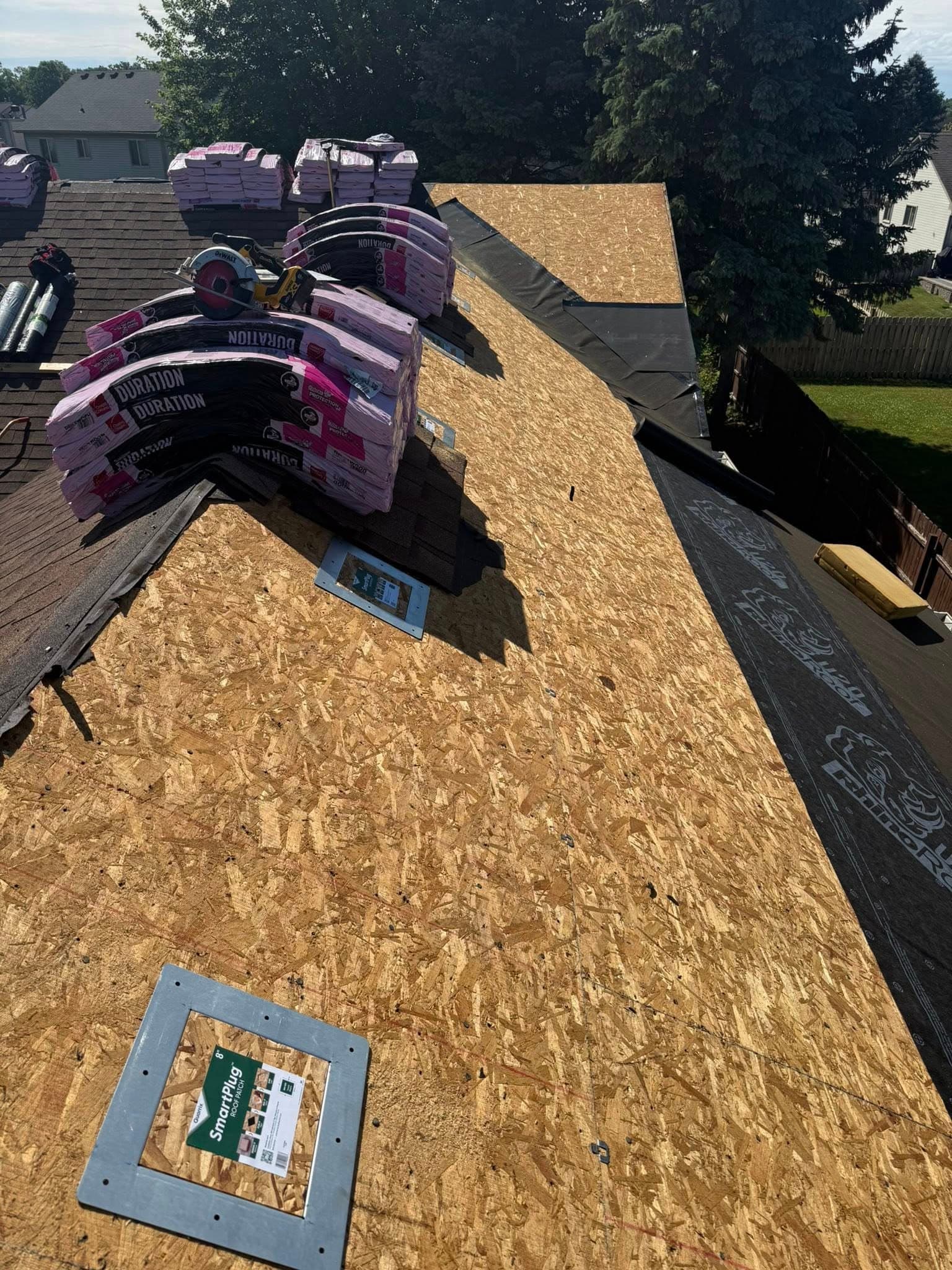 Hail damaged roof before restoration in Macomb, MI